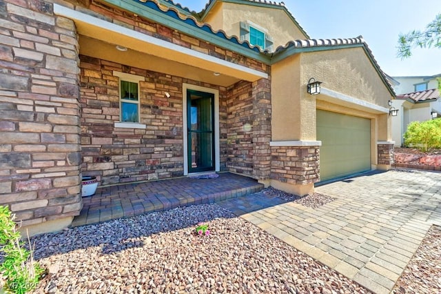 property entrance featuring a garage