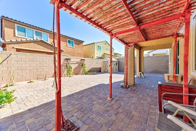 view of patio / terrace with a storage unit