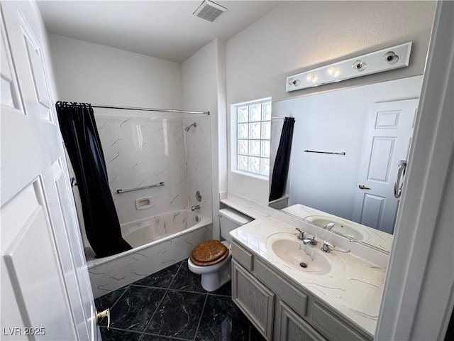 full bathroom featuring toilet, shower / bath combo, and vanity