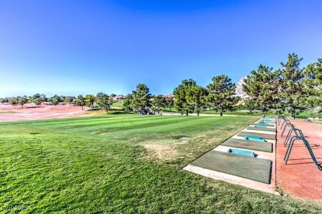 view of home's community with a lawn