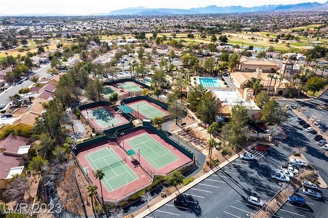 birds eye view of property featuring a mountain view