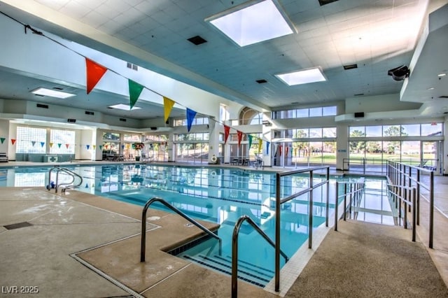 view of pool with a skylight