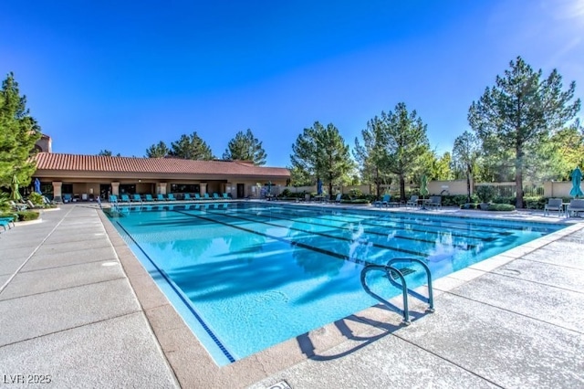 view of swimming pool featuring a patio area