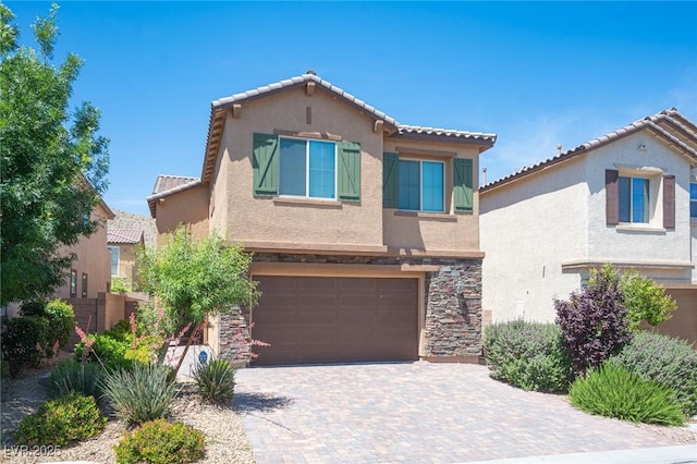 view of front of property with a garage