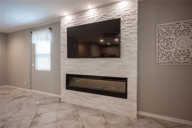 room details featuring a stone fireplace