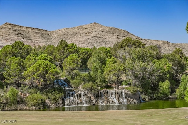 property view of mountains featuring a water view