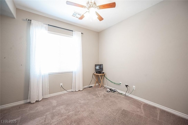 unfurnished room featuring carpet floors and ceiling fan