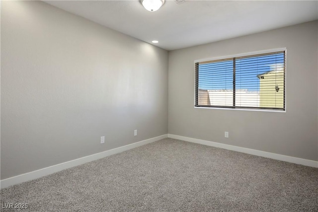 empty room featuring carpet floors