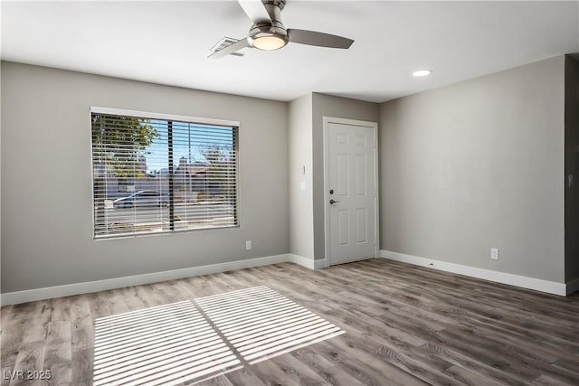 unfurnished room featuring wood-type flooring and ceiling fan