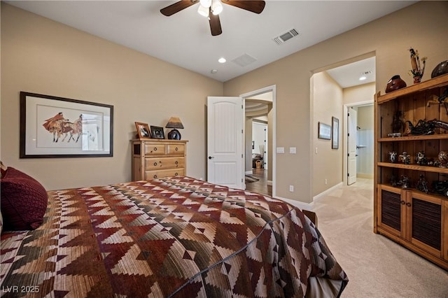 bedroom featuring ceiling fan and light carpet