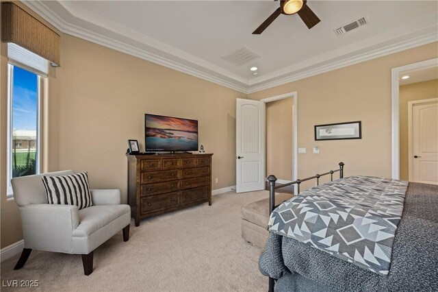 carpeted bedroom with ceiling fan and crown molding