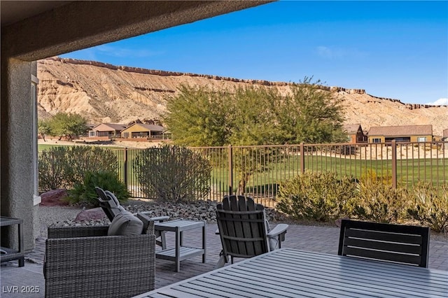 view of patio / terrace with a mountain view