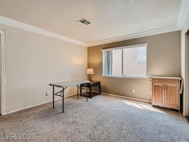 home office featuring a textured ceiling, light carpet, and ornamental molding