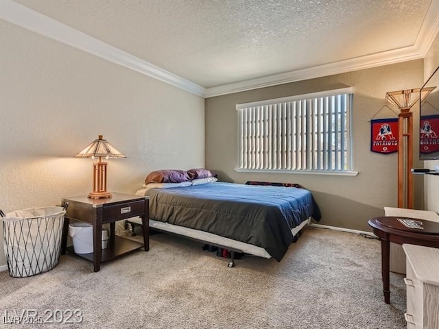 carpeted bedroom with a textured ceiling and ornamental molding