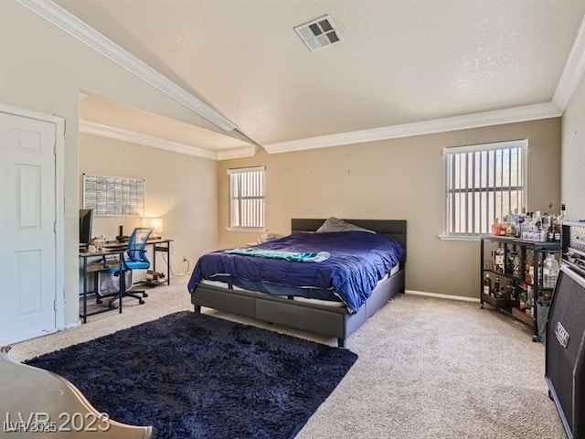 bedroom featuring lofted ceiling, crown molding, and carpet flooring