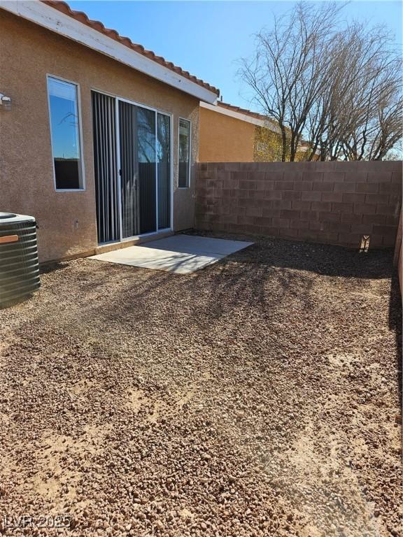 exterior space featuring central AC and a patio area