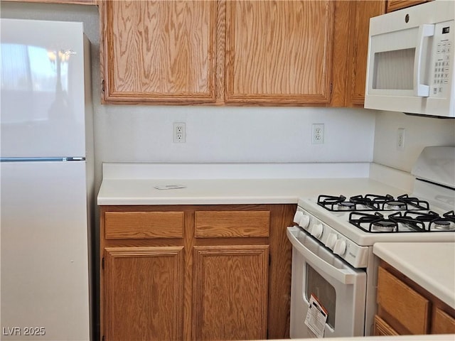 kitchen with white appliances