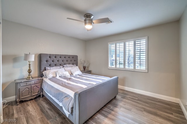 bedroom featuring ceiling fan and hardwood / wood-style flooring