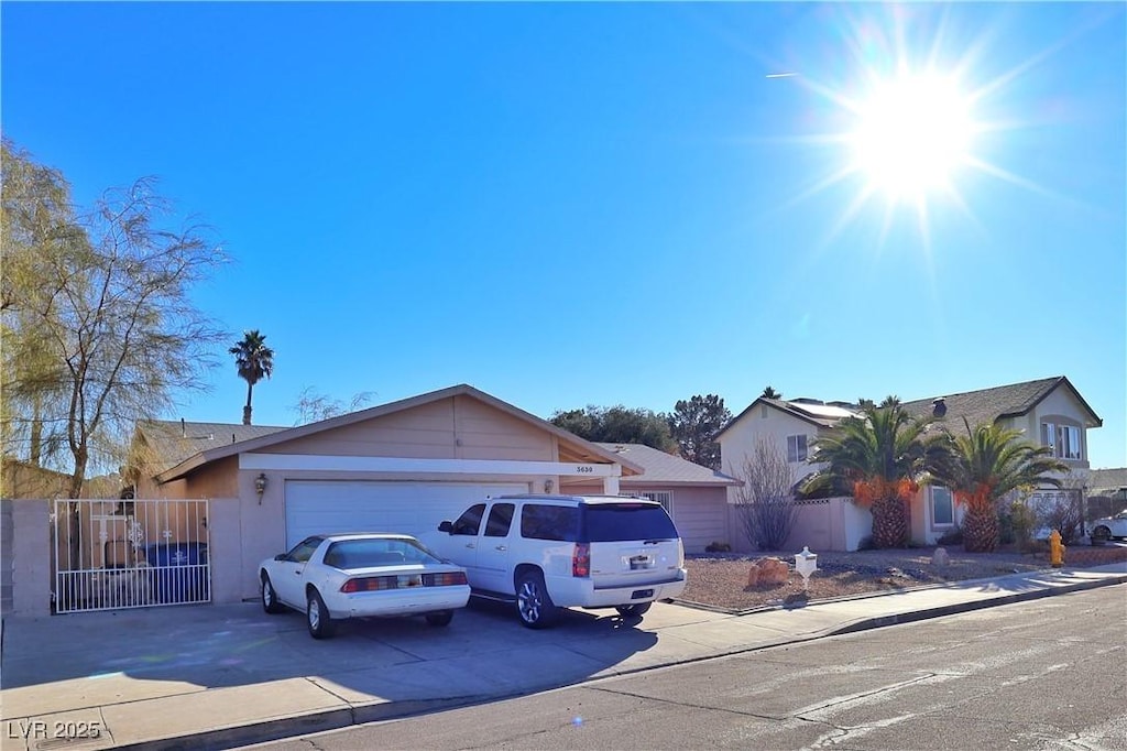 ranch-style home with a garage