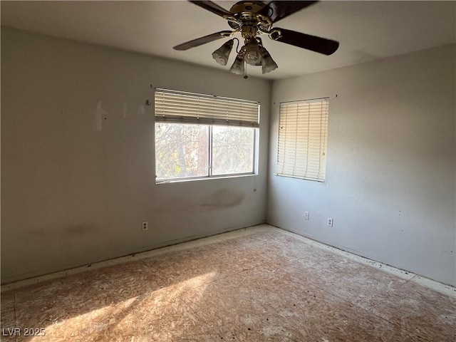 empty room with ceiling fan