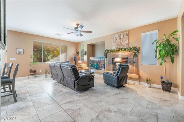 living room featuring ceiling fan