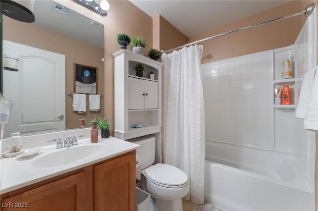 full bathroom featuring shower / bathtub combination with curtain, vanity, and toilet