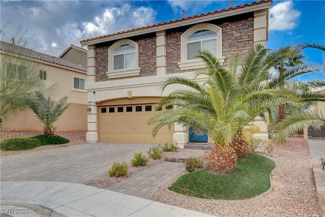 mediterranean / spanish-style house featuring a garage