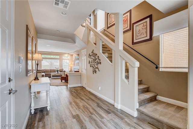 entrance foyer featuring light hardwood / wood-style floors