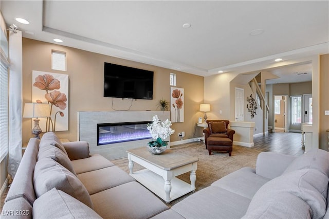 living room featuring a fireplace