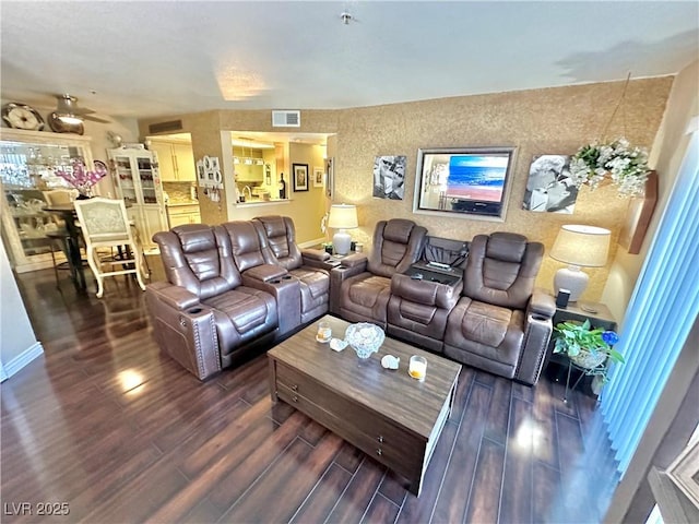 living room with dark hardwood / wood-style flooring