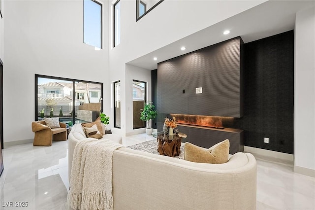 living room with a high ceiling