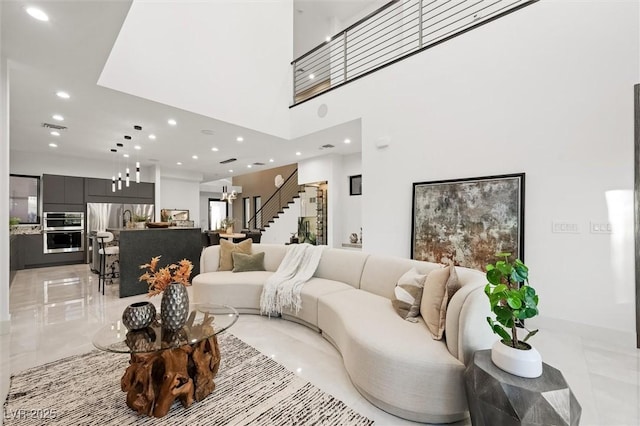 living room with a high ceiling