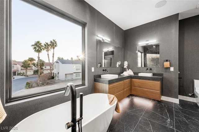 bathroom featuring vanity and separate shower and tub