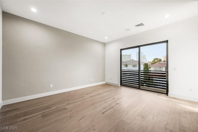 empty room featuring light hardwood / wood-style flooring