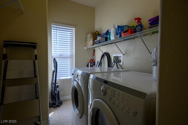 clothes washing area featuring separate washer and dryer