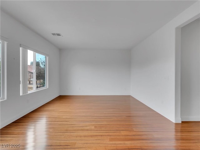 empty room featuring light hardwood / wood-style flooring