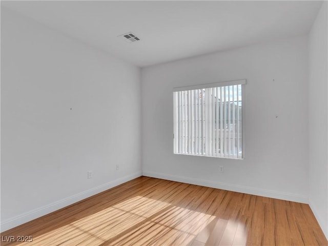 empty room with light wood-type flooring