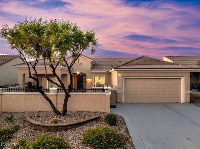 view of front of house with a garage