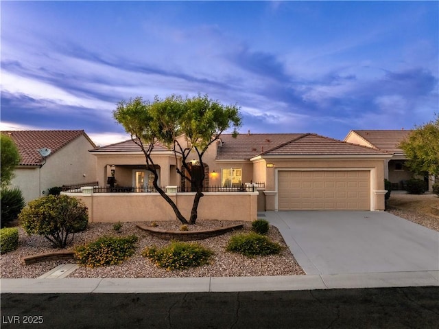 view of front of property featuring a garage