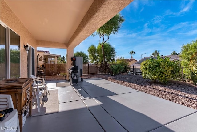 view of patio with a grill