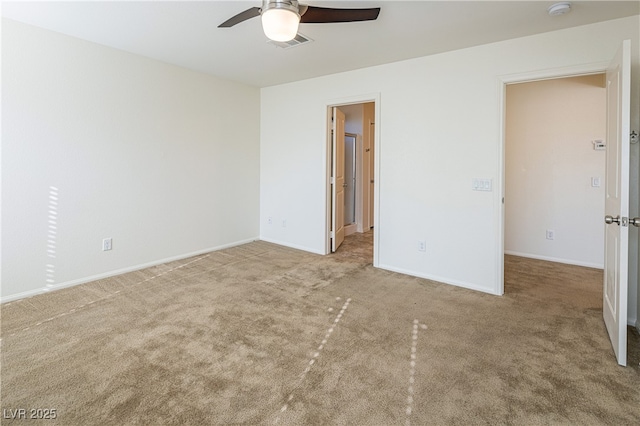 unfurnished bedroom with ceiling fan and carpet