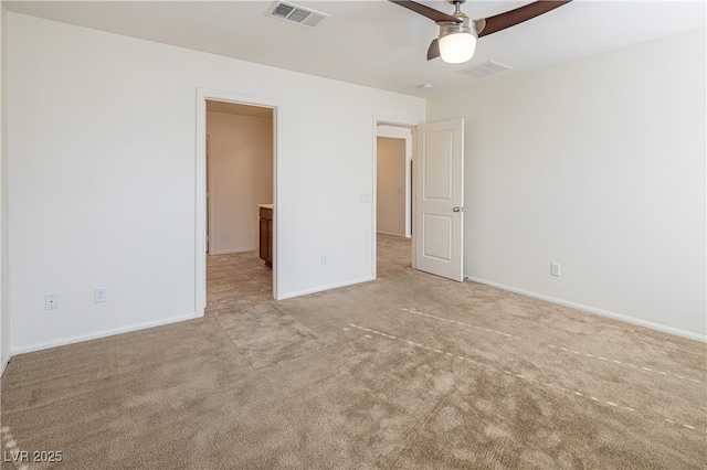 unfurnished bedroom featuring ceiling fan and light carpet