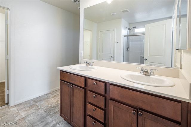 bathroom featuring vanity and walk in shower