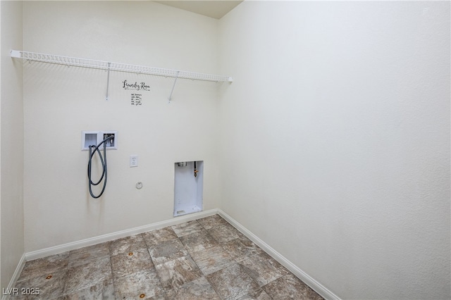 clothes washing area featuring gas dryer hookup and washer hookup