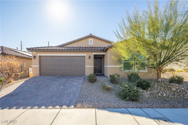 view of front of property featuring a garage