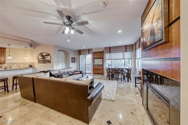 living room with ceiling fan