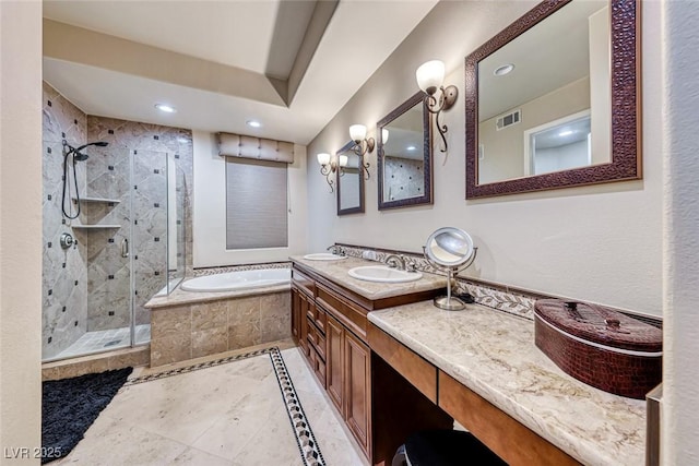 bathroom featuring independent shower and bath and vanity