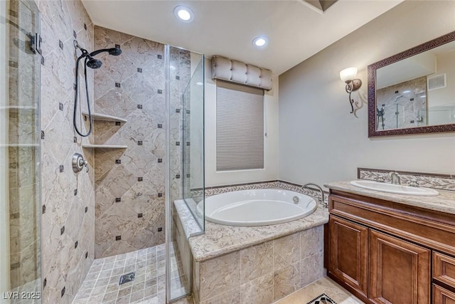 bathroom featuring independent shower and bath and vanity