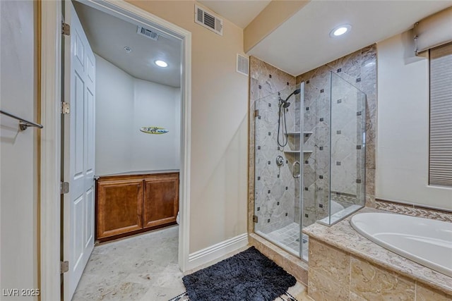 bathroom featuring plus walk in shower