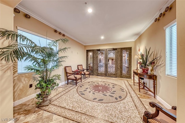 interior space with ornamental molding and french doors